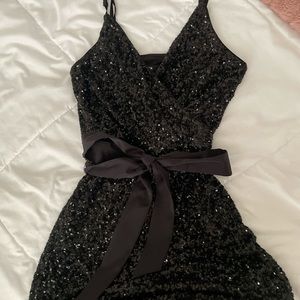 BLACK SEQUENCE JUMPSUIT FROM EXPRESS (BRAND NEW)